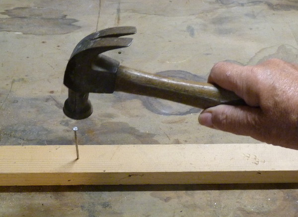 hammer used to sink nail
